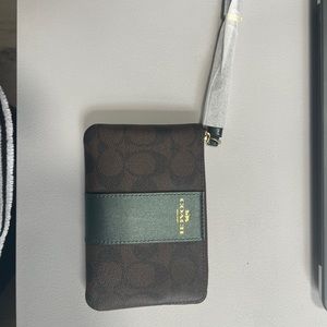 Brand new never used coach wristlet